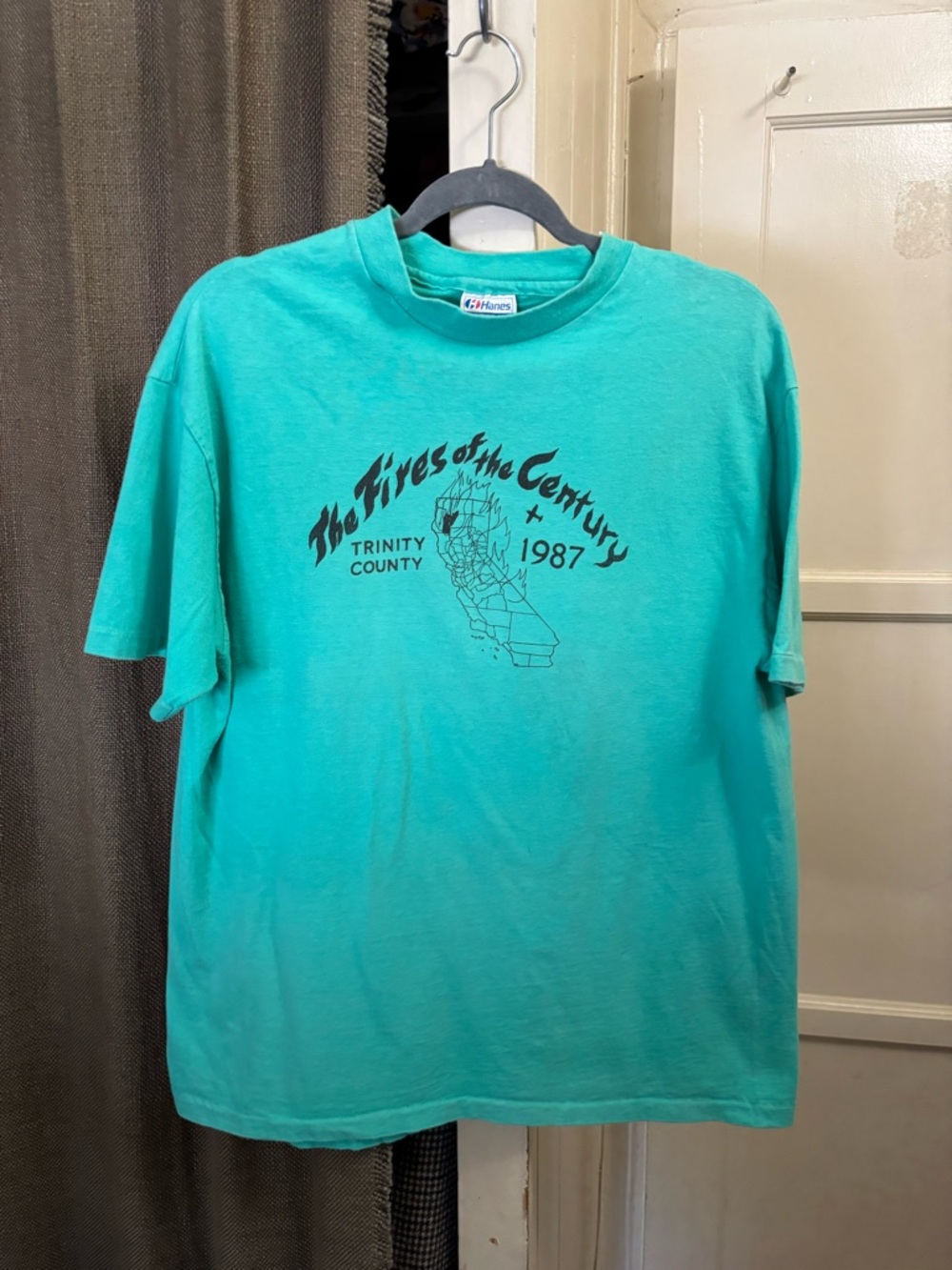 Hanes Teal Graphic 'Fires of the Century' Short Sleeve Tee